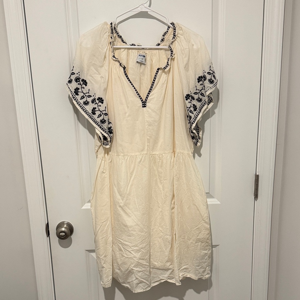 Elegant Cream Dress with Black Embroidery